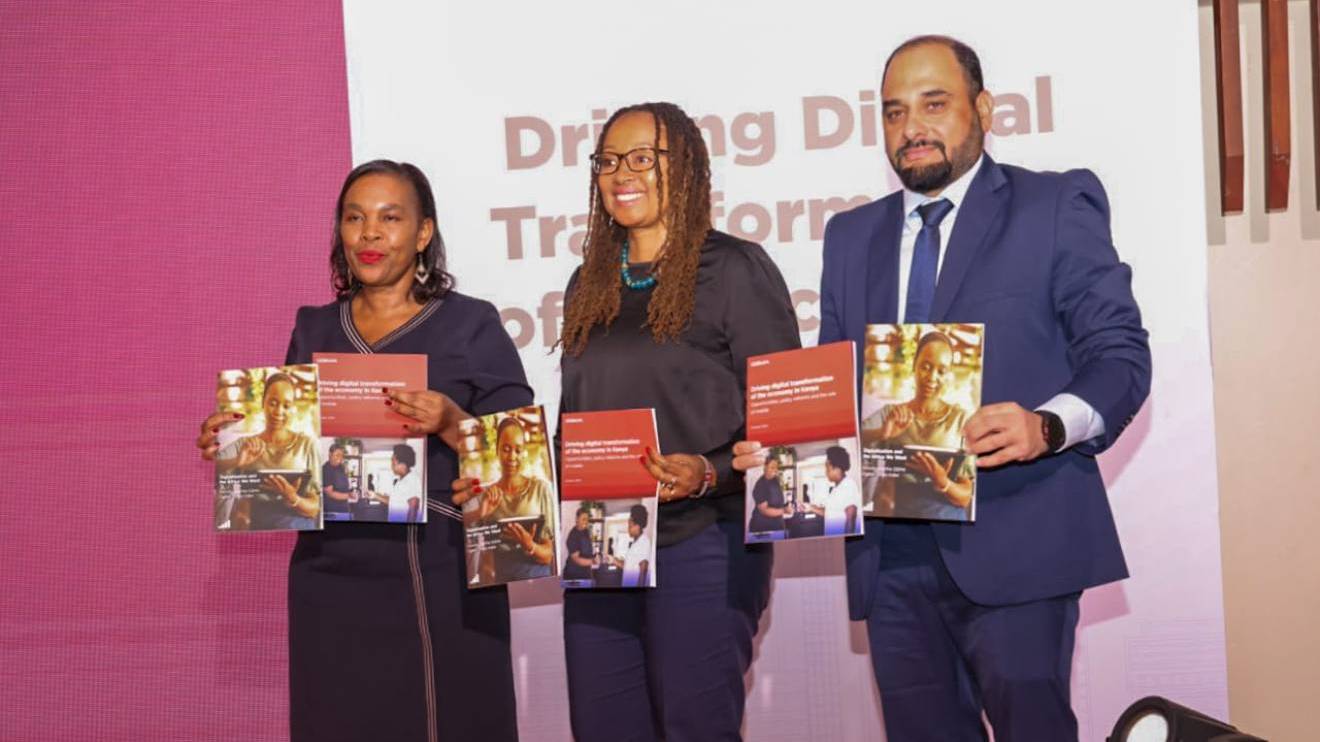 Margaret Nyambura (Left) joins other stakeholders during the launch of the Kenya Digitization report by GSMA. PHOTO/COURTESY